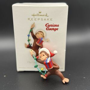 2012 Hallmark Keepsake Curious George Ornament “The Light Of The Party!”